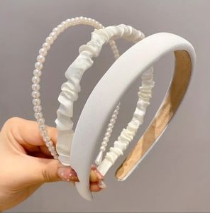 Sophisticated White Headband Trio with Pearl and Textured Designs